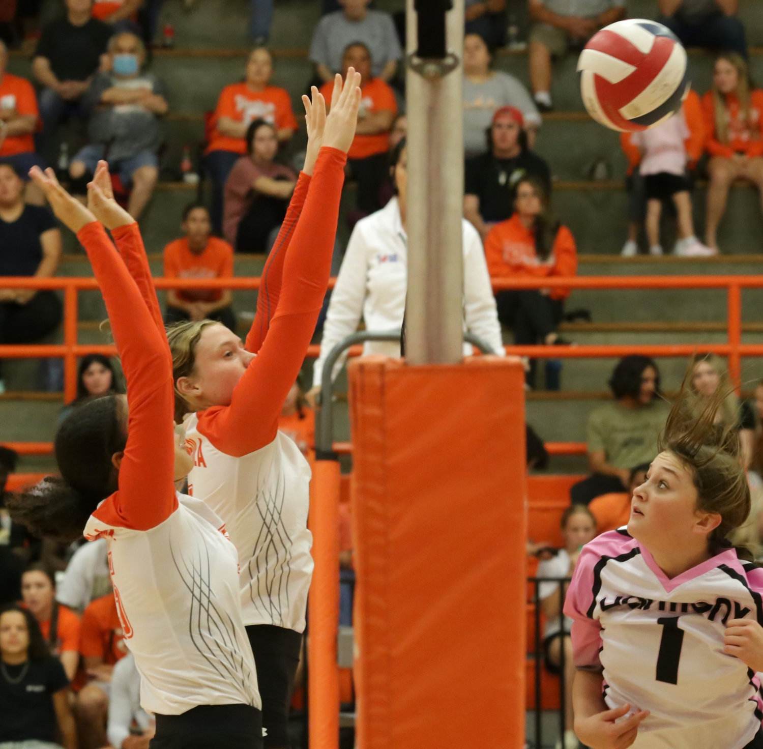 Mylee Fischer eyes the result of a block she executed with teammate Kyra Jackson.